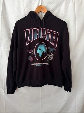 Divided Black Hoodie with Pink and Teal Graphic